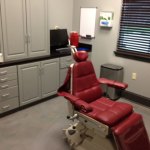 dental suite with a red chair