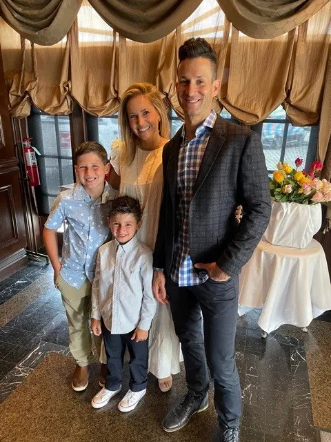 Dr. Boudreaux with his wife and two sons