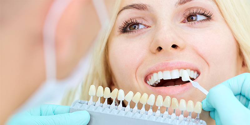 woman getting fit for dental implants