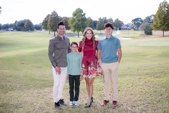 Dr. Boudreaux with his wife and two childresn